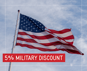 American flag flying in the wind promoting a 5% military discount.